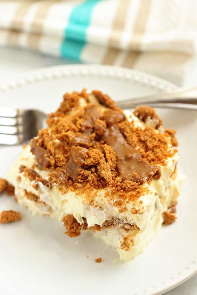 This Easy Biscoff Layer Dessert is the ultimate no-bake treat with layers of Biscoff cookies, dreamy cookie butter, and vanilla cream cheese pudding.  It comes together in one irresistible dish. Perfect for make-ahead gatherings!