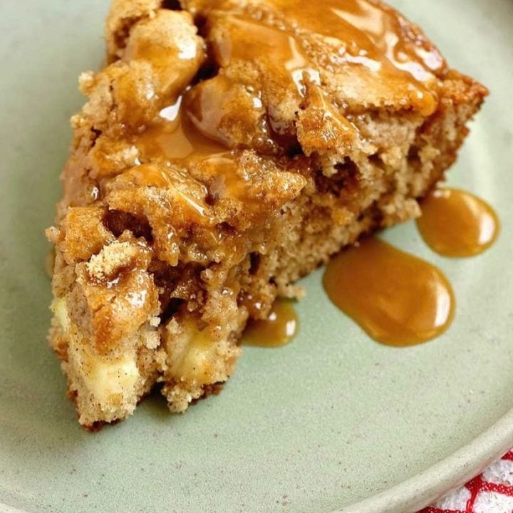Caramel Apple Skillet Cake is loaded with shredded apples, swirled with brown sugar, and topped with salted caramel. Cozy fall baking at its best.