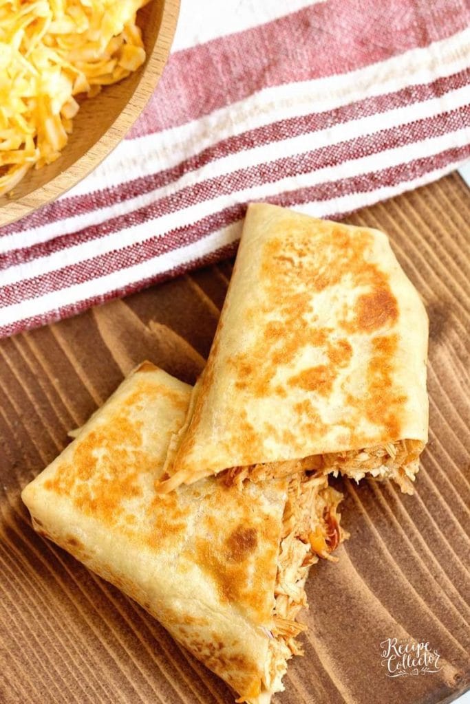 Slow Cooker BBQ Chicken Wraps filled with barbecue sauce, melty cheese, and cooked red onions. An easy weeknight dinner busy families will love.
