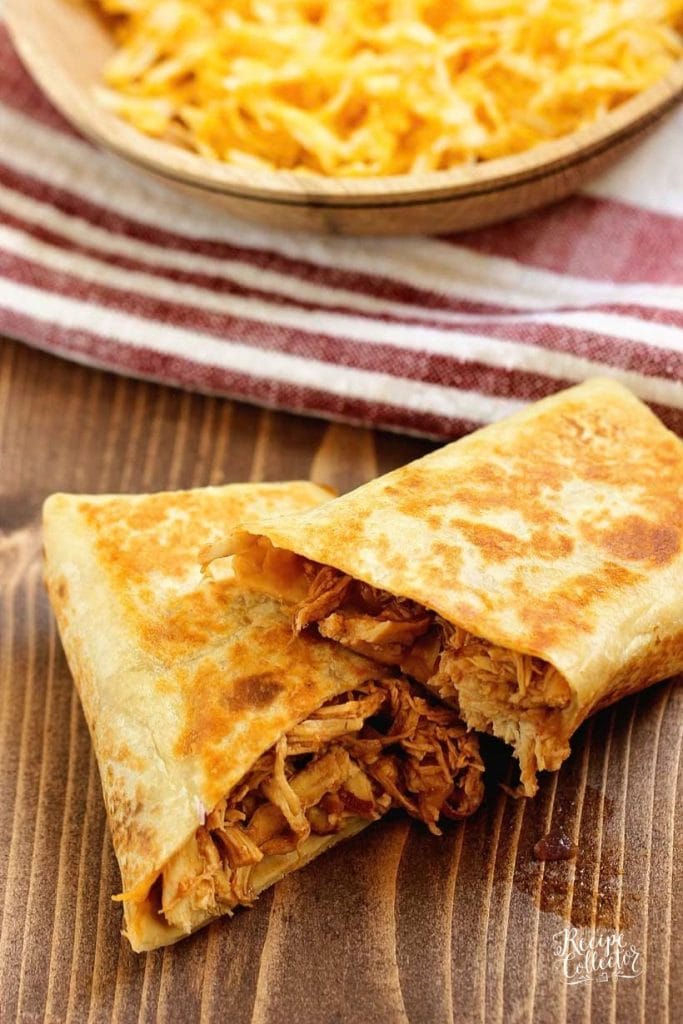 Slow Cooker BBQ Chicken Wraps filled with barbecue sauce, melty cheese, and cooked red onions. An easy weeknight dinner busy families will love.